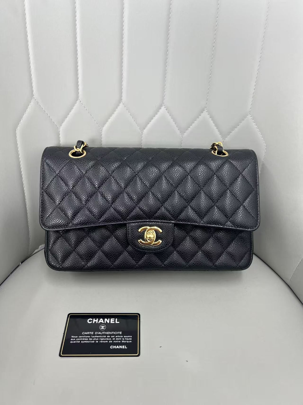 Chanel black medium caviar classic flap, gold hdw 28 series