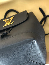 Load image into Gallery viewer, Louis Vuitton black lock me backpack, gold hdw
