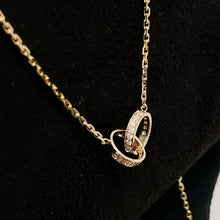 Load image into Gallery viewer, Cartier 18K rose gold double rings love pendant, half-paved diamond
