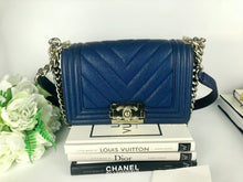 Load image into Gallery viewer, Chanel small blue caviar chevron boy, gold hdw
