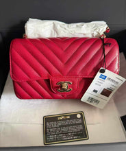 Load image into Gallery viewer, Chanel 18B raspberry red mini caviar chevron, with light gold hardware
