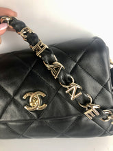 Load image into Gallery viewer, Chanel black woven logo flap from 2021 cruise collection, gold hdw
