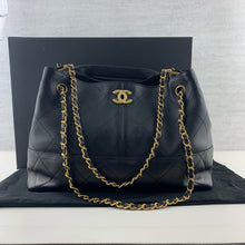 Load image into Gallery viewer, Chanel 25A hobo small black calfskin, coco base shopping bag with light gold hardware
