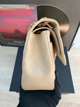 Load image into Gallery viewer, Chanel double flap jumbo beige caviar with gold hardware.
