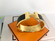 Load image into Gallery viewer, Hermes black / gold clic clac GM
