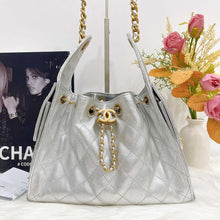 Load image into Gallery viewer, Chanel 25 small in rare silver caviar, aged gold hdw
