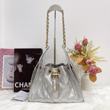 Load image into Gallery viewer, Chanel 25 small in silver caviar, aged gold hdw
