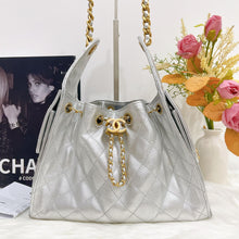 Load image into Gallery viewer, Chanel 25 small in silver caviar, aged gold hdw
