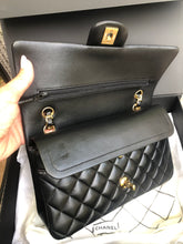 Load image into Gallery viewer, Chanel 31 series black lambskin medium flap, gold hardware
