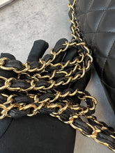 Load image into Gallery viewer, Chanel black lambskin jumbo classic flap with gold hardware
