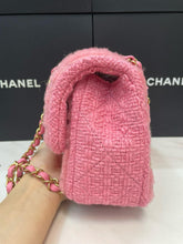 Load image into Gallery viewer, Chanel bag medium pink fur with gold hardware.
