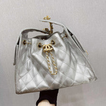 Load image into Gallery viewer, Chanel 25 small in rare silver caviar, aged gold hdw
