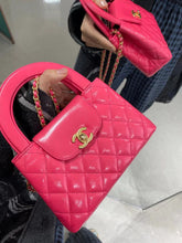 Load image into Gallery viewer, Chanel 24p dark pink Kelly (large), gold hdw
