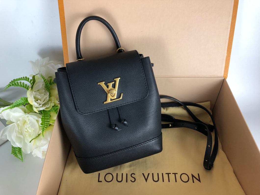 Louis Vuitton black lock me backpack, gold hdw