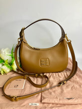 Load image into Gallery viewer, Mui mui leather wander bag, gold tone hdw
