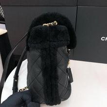 Load image into Gallery viewer, Chanel shearling and lambskin  backpack black, gold hdw
