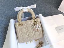 Load image into Gallery viewer, Lady Dior mini beige with gold hardware.
