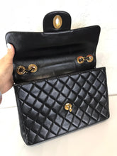 Load image into Gallery viewer, Chanel 24k gold hdw vintage black jumbo XL
