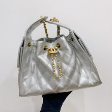 Load image into Gallery viewer, Chanel 25 small in silver caviar, aged gold hdw
