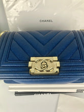 Load image into Gallery viewer, Chanel small blue caviar chevron boy, gold hdw
