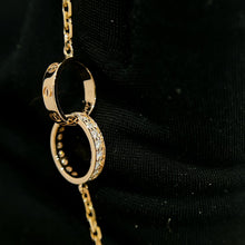 Load image into Gallery viewer, Cartier 18K rose gold double rings love pendant, half-paved diamond
