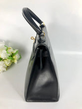 Load image into Gallery viewer, Hermes Vintage black box Kelly 28, gold hdw with clochette
