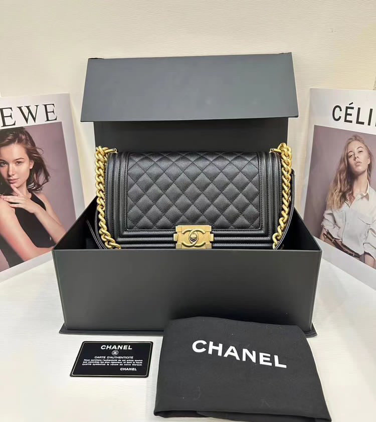 Chanel old medium black caviar boy deposit