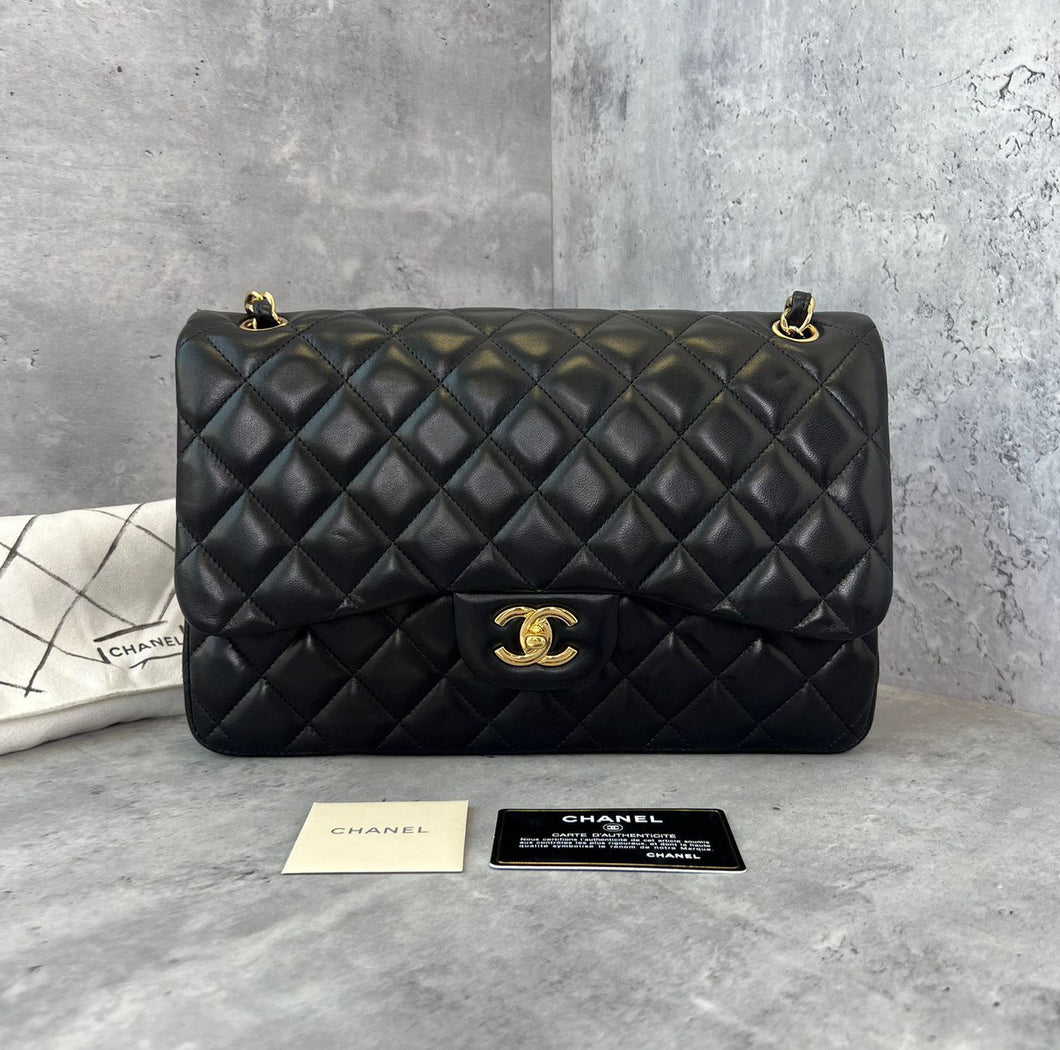 Chanel black lambskin jumbo classic flap with gold hardware