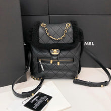 Load image into Gallery viewer, Chanel shearling and lambskin  backpack black, gold hdw
