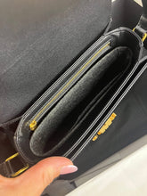 Load image into Gallery viewer, Celine 2023 black Classic Teen Triomphe, with shiny gold hdw.
