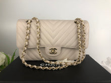 Load image into Gallery viewer, Chanel 18b ivory chevron caviar medium classic with light gold hdw
