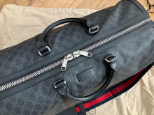 Load image into Gallery viewer, Gucci large black supreme duffle bag, with strap
