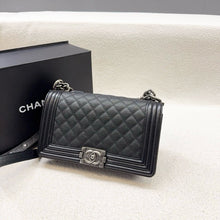 Load image into Gallery viewer, Chanel old medium boy black caviar with ruthenium hardware
