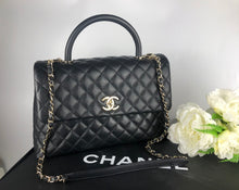 Load image into Gallery viewer, Chanel large black caviar coco handle, light gold hardware
