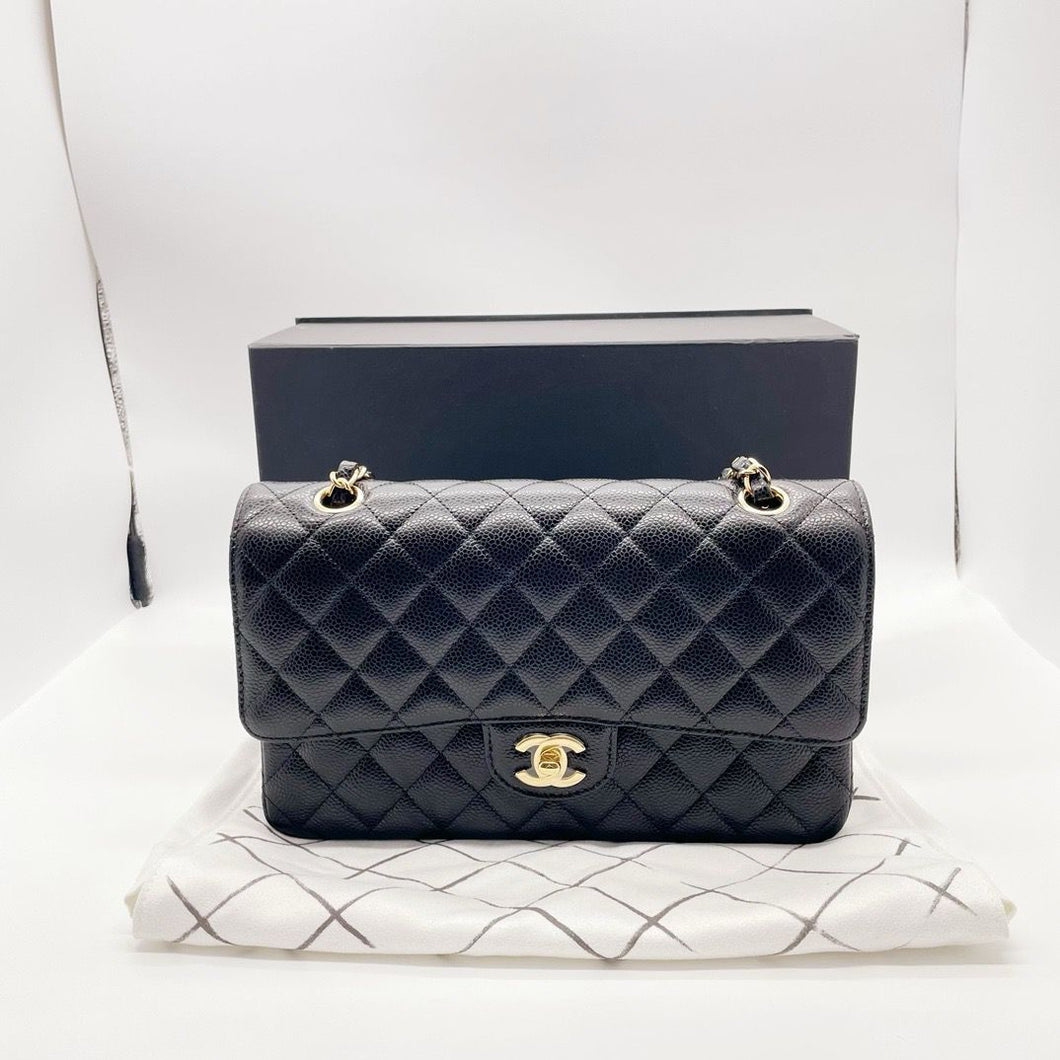 Chanel black caviar medium classic, gold hardware, chip