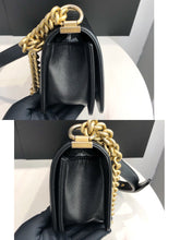 Load image into Gallery viewer, Chanel small black caviar boy bag, with gold hdw
