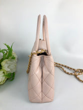 Load image into Gallery viewer, Chanel Kelly light pink, with aged gold hdw
