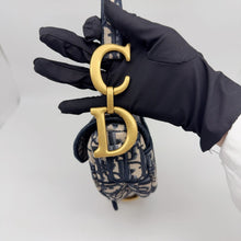 Load image into Gallery viewer, Dior blue oblique monogram jacquard medium saddle bag, with gold hardware and guitar strap

