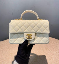 Load image into Gallery viewer, Chanel white caviar mini top handle with aged gold hdw
