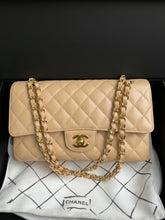 Load image into Gallery viewer, Chanel medium beige caviar classic flap with gold hdw
