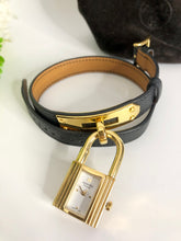 Load image into Gallery viewer, Hermes black leather strap Kelly watch, gold hdw.
