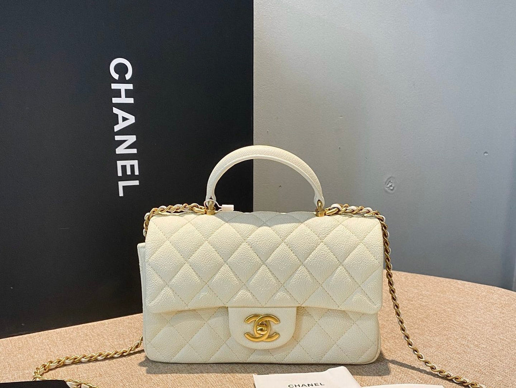 Chanel white caviar mini top handle with aged gold hdw