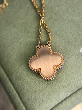 Load image into Gallery viewer, Van Cleef &amp; Arpels (VCA) 2012 holiday mother of pearl (mop) 18k rose gold and diamond pendant
