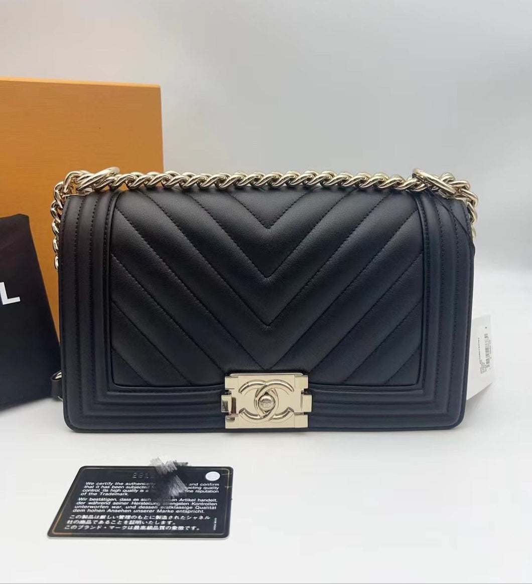 Chanel black old medium calfskin chevron boy, gold hdw