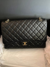 Load image into Gallery viewer, Chanel black caviar Maxi single flap, gold hdw.
