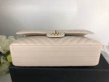 Load image into Gallery viewer, Chanel 18b ivory chevron caviar medium classic with light gold hdw
