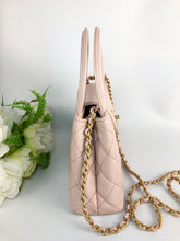 Load image into Gallery viewer, Chanel Kelly light pink, with aged gold hdw
