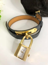 Load image into Gallery viewer, Hermes black leather strap Kelly watch, gold hdw
