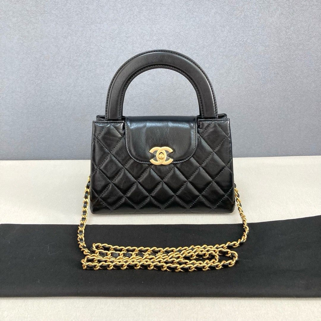 Chanel black nano Kelly (larger size, calfskin with gold hdw