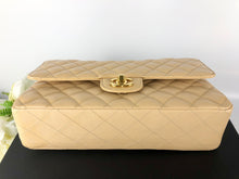 Load image into Gallery viewer, Chanel beige caviar medium classic flap, gold hdw
